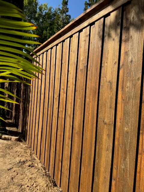 Stained wood fence
